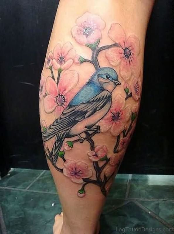 Colorful Bird Tattoo On Leg