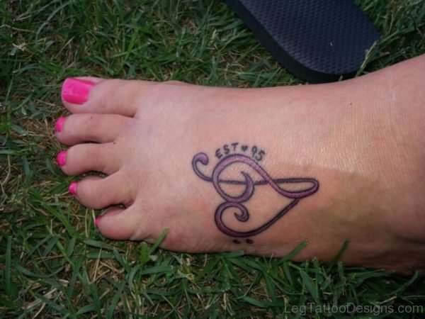 Colorful Music Tattoo On Foot 