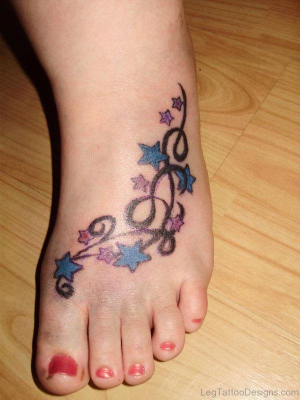 Colorful Stars Tattoo On Foot