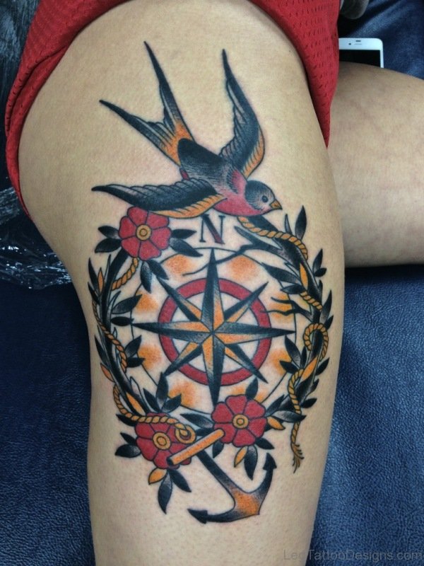 Compass And Bird Tattoo On Thigh