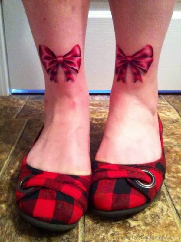 Cool Red Bow Tattoo On Leg