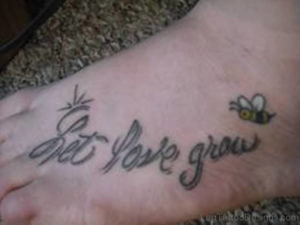 Cute Bee And Wording Tattoo On Foot
