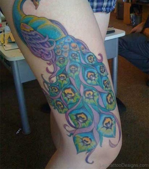 Cute Peacock Tattoo On Thigh