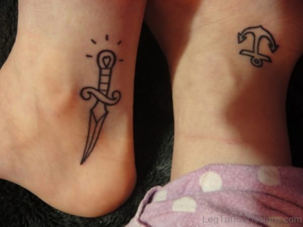 Dagger And Anchor Tattoo On Ankle