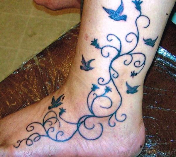 Designer Bird Tattoo On Leg