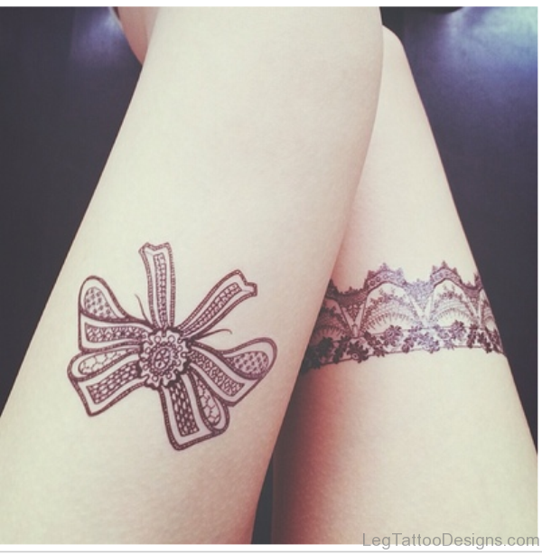 Designer Bow Tattoo On Thigh