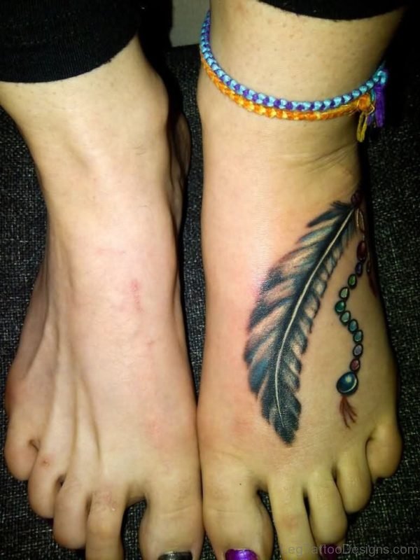 Elegant Feather Tattoo On Foot