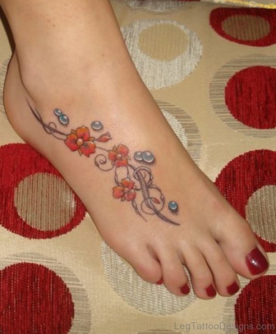 Elegant Flower Tattoo On Foot