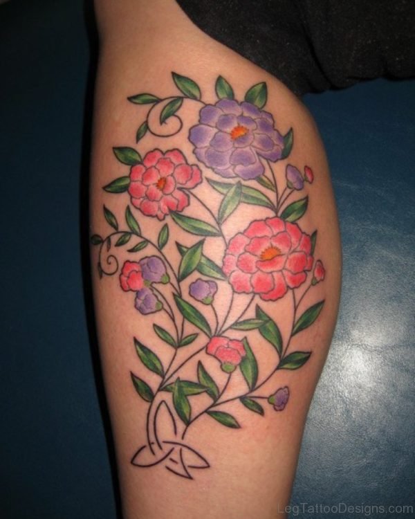 Elegant Flowers Tattoo On Thigh