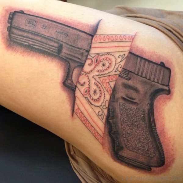 Elegant Gun Tattoo On Thigh