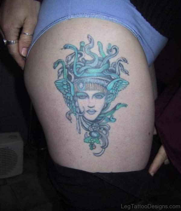 Elegant Medusa Winged Head Tattoo On Thigh