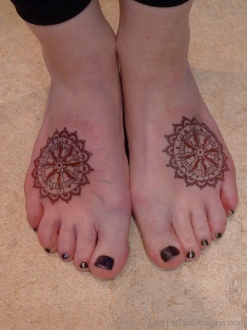 Elegant Ship Wheel Tattoo Design On Foot