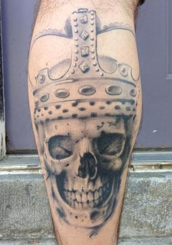 Fabulous Grey Ink King Skull Tattoo On Leg