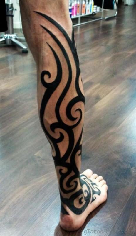Fantastic Tribal Tattoo On Right Leg