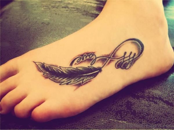 Feather And Infinity Tattoo On Left Foot