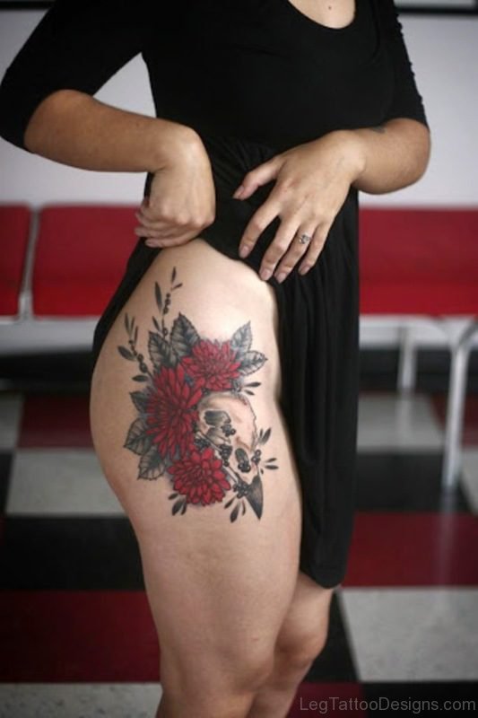 Flower And Skull Tattoo On Thigh