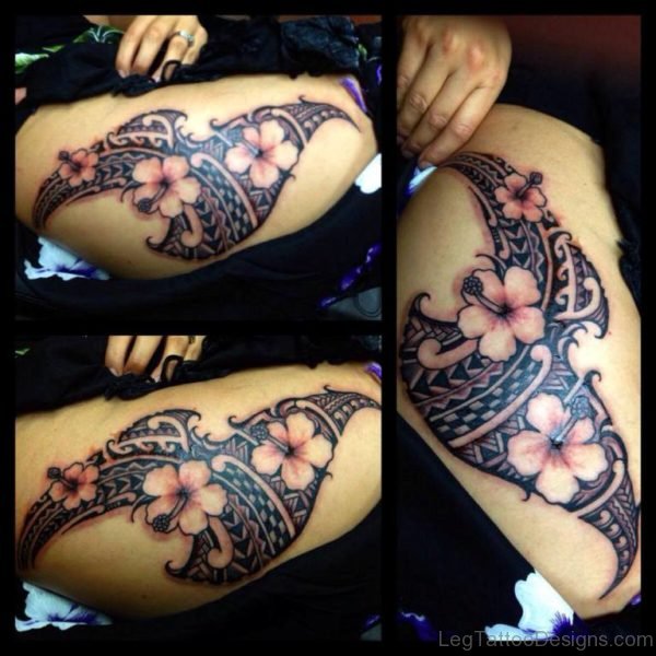 Flower And Tribal Tattoo On Thigh