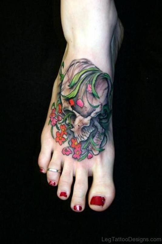 Flowers And Skull Tattoo On Foot On Right Foot