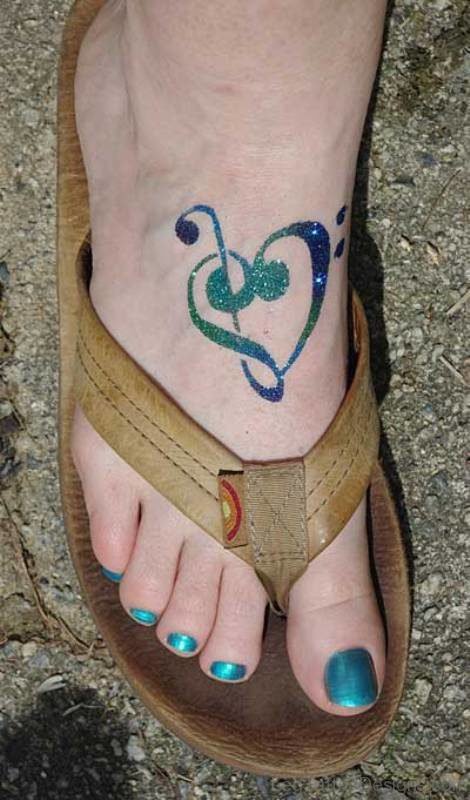 Glittering Musical Note Tattoo On Foot 