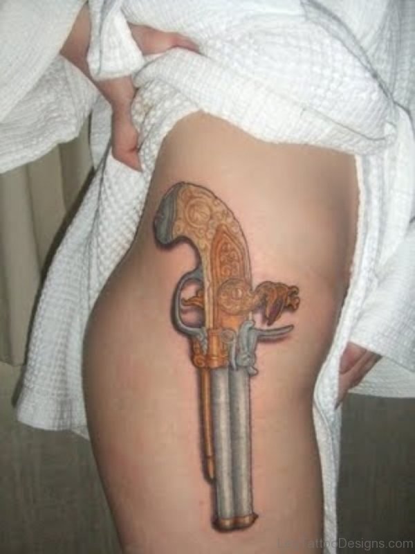 Great Looking Gun Tattoo