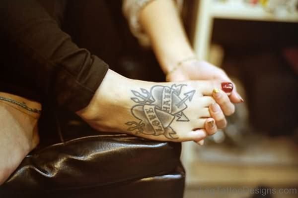 Grey Heart Tattoo On Foot