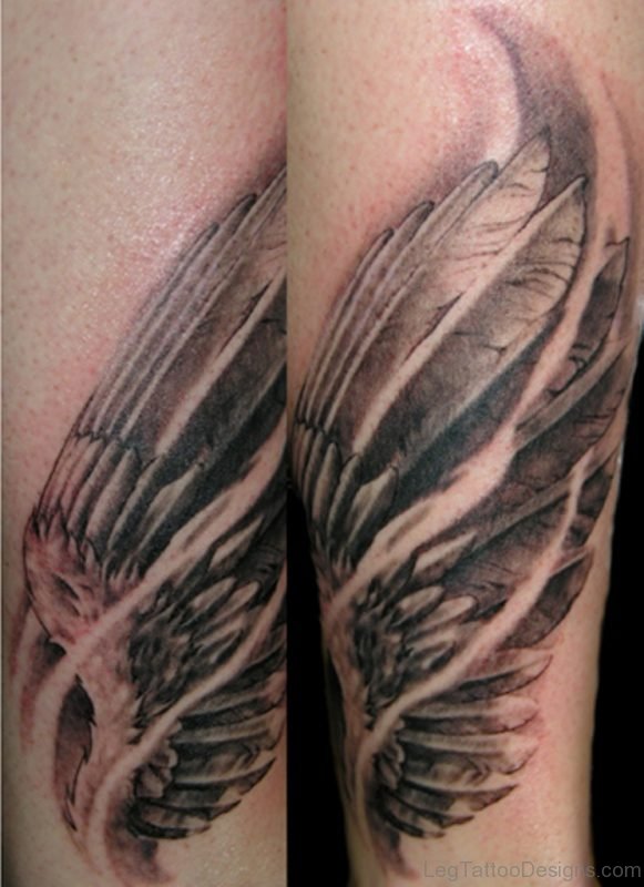 Grey Ink Sandclock With Wings Tattoo
