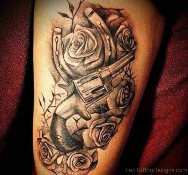 Gun And Flower Tattoo