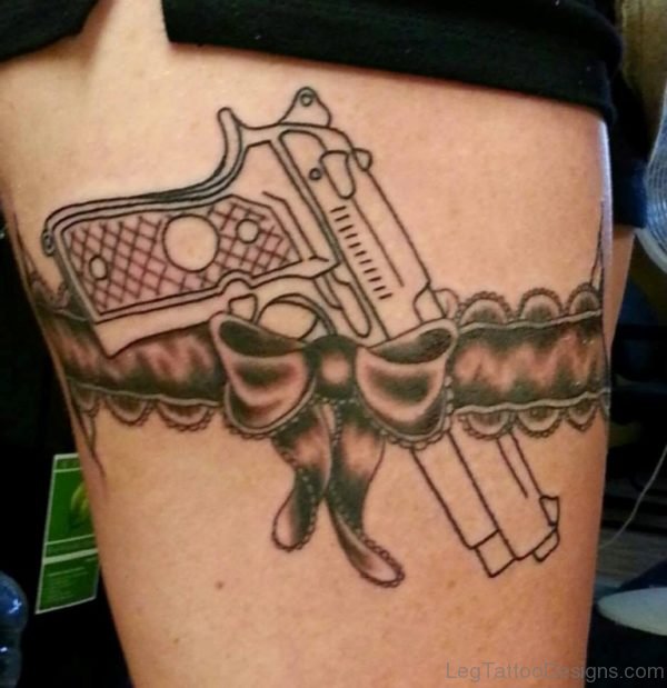 Gun Tattoo On Thigh