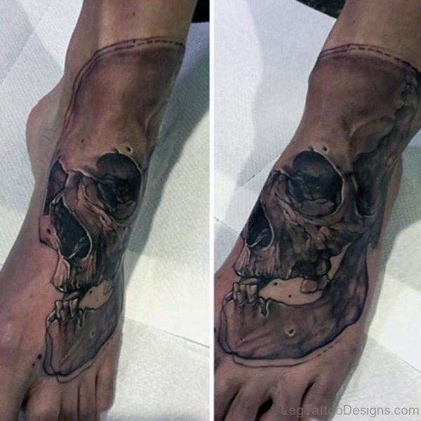 Hollow Eyed Skull Tattoo On Foot For Men