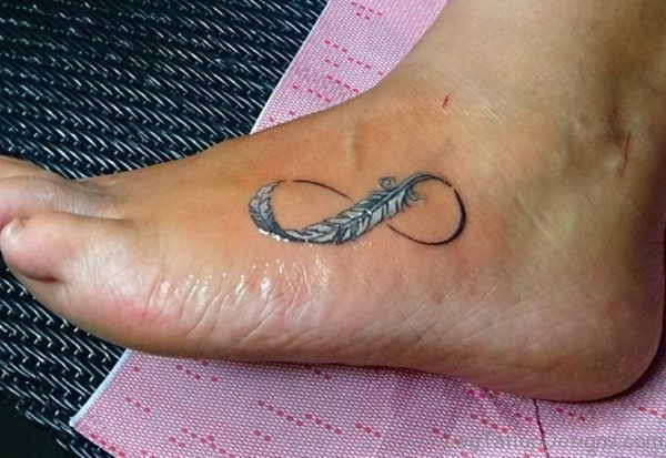 Infinity White Feather Tattoo On Left Foot