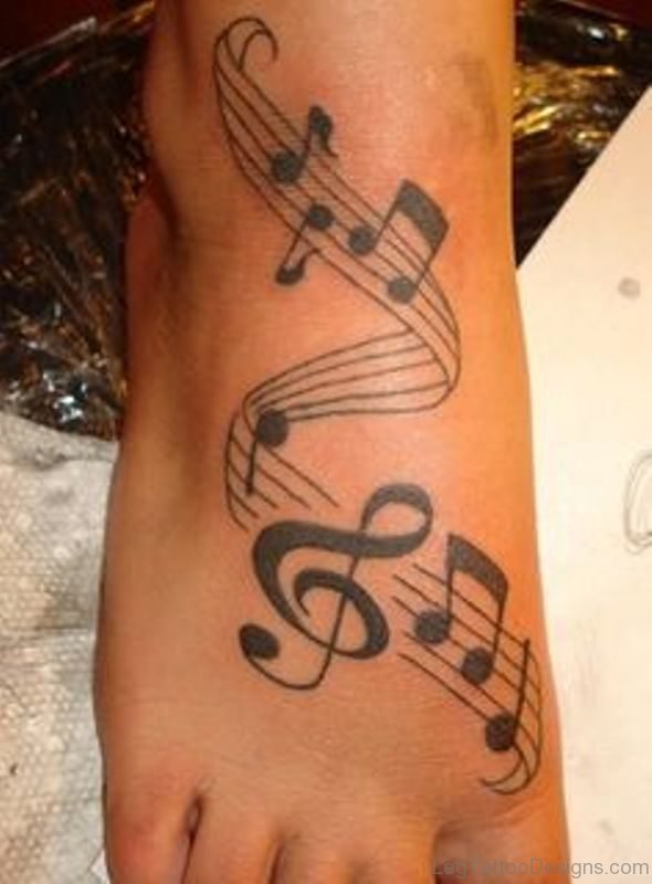 Lovely Musical Tattoo On Foot