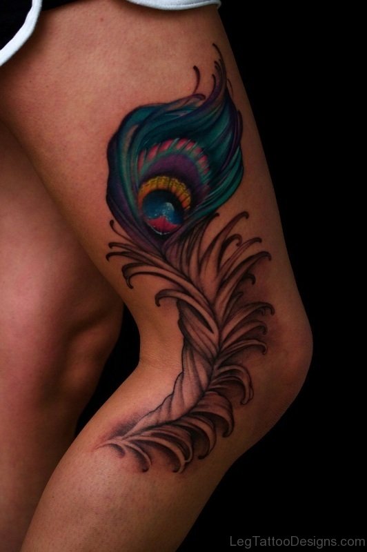 peacock feather tattoo on thigh