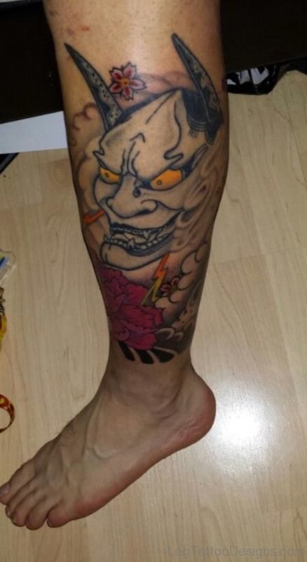 Mask Tattoo On Leg