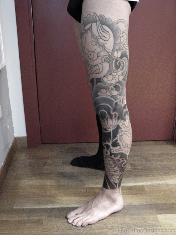 Mask Tattoo On Leg Image