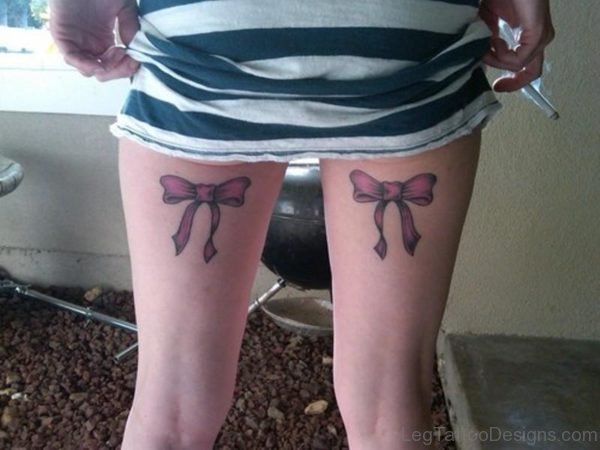 Matching Pink Bow Tattoo On Thigh