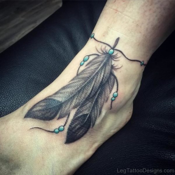 Mind Blowing Feather Tattoo On Foot