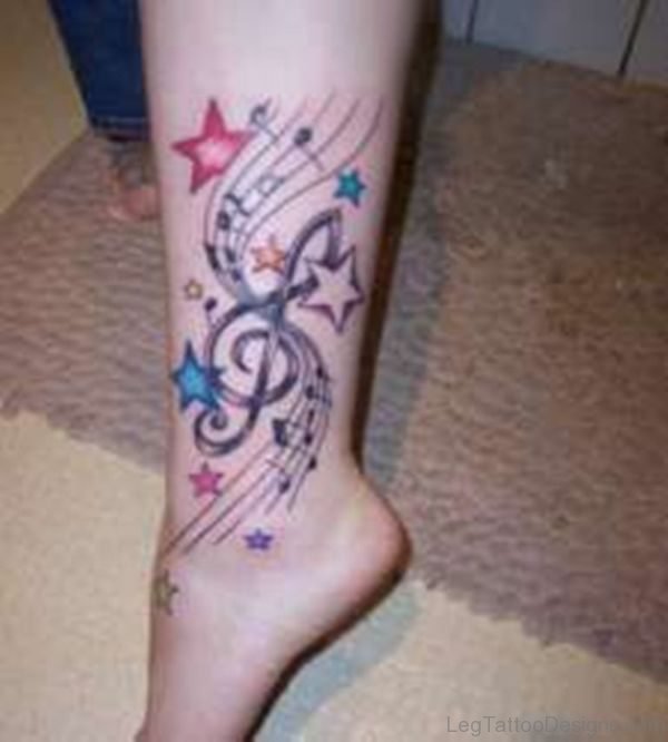 Music Note And Star Tattoo On Leg