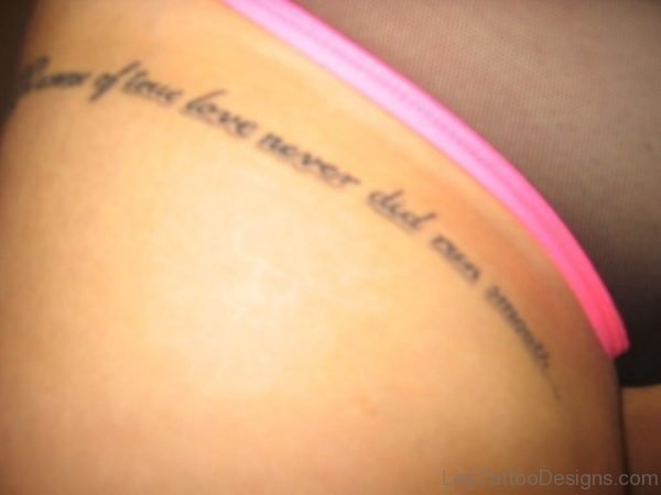 Nice Black Writing Tattoo On Upper Thigh