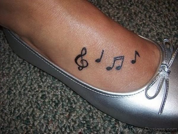 Nice Musical Note Tattoo Design 