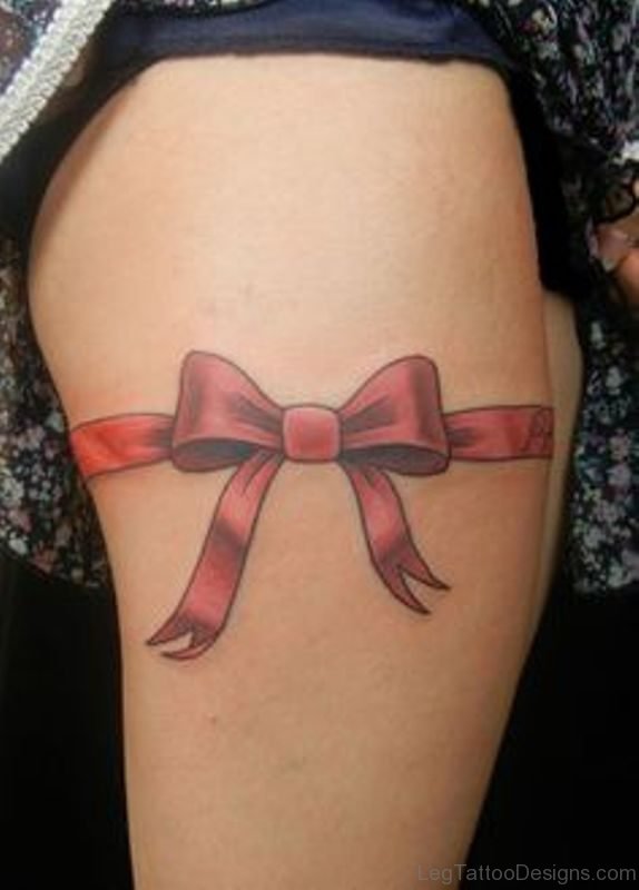 Nice Red Bow Thigh Tattoo