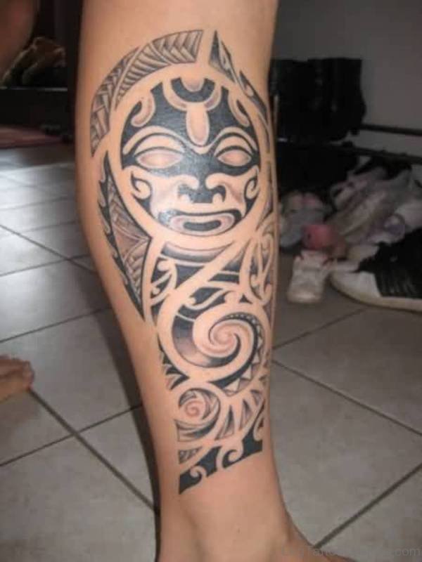 Nice Tribal Mask Leg Tattoo Design For Men