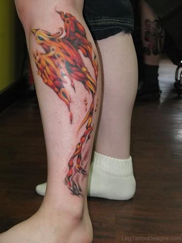 Orange Flying Bird Tattoo On Leg