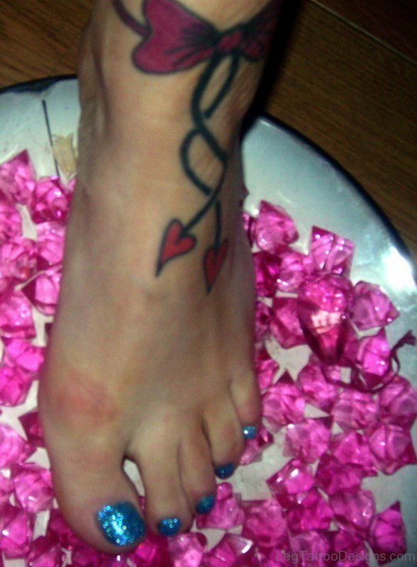 Pink Bow Tattoo On Ankle