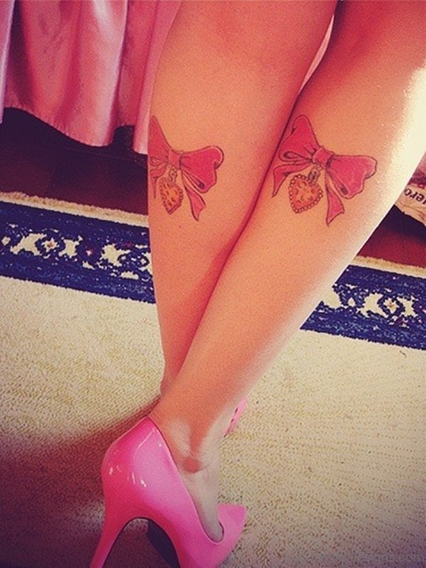 Pink Bow With Heart Tattoo On Leg