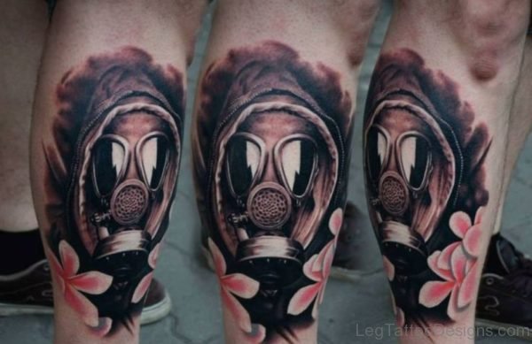 Pink Flowers And Gas Mask Tattoo On Leg