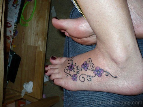 Pretty Flower Tattoo On Foot