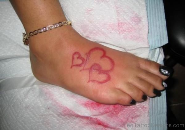 Red Heart Tattoo On Foot