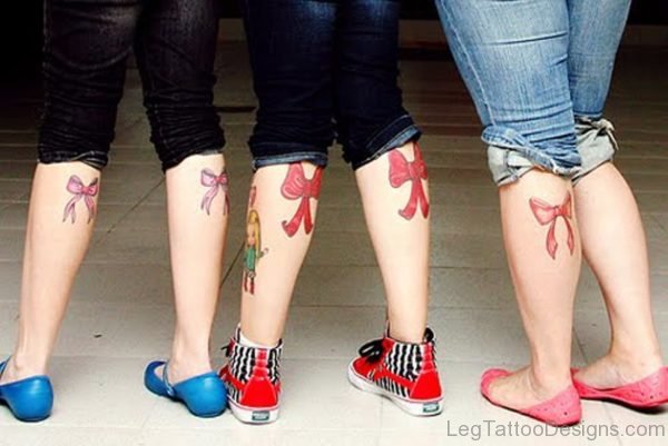 Red Ribbow Boe Tattoo On Leg