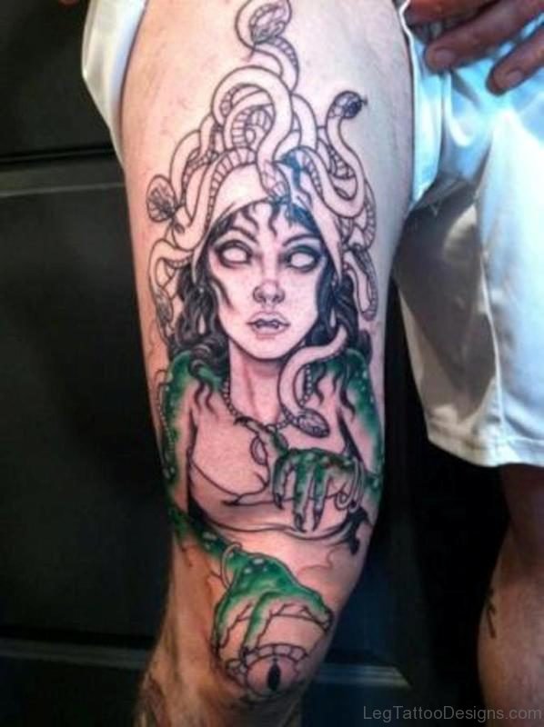 Showing Medusa Tattoo On Thigh