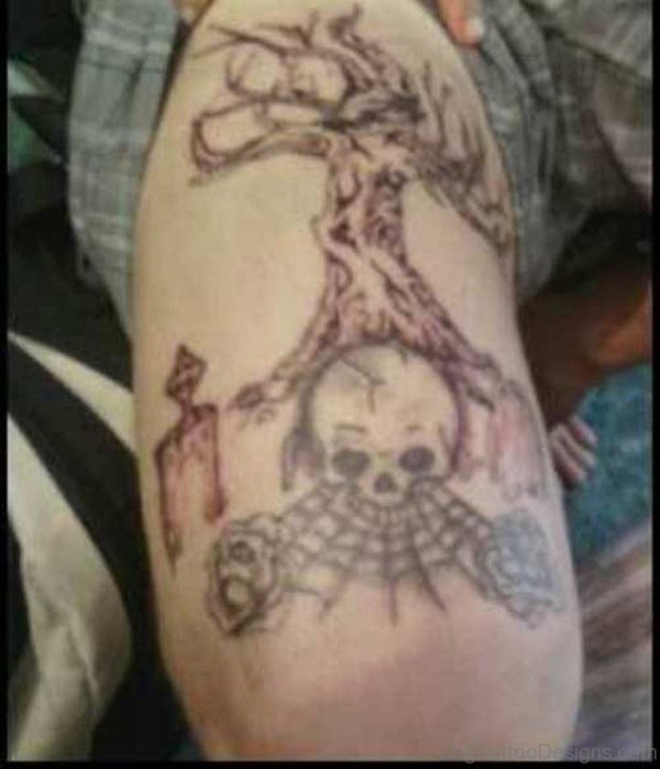 Skull And Tree Tattoo On Thigh